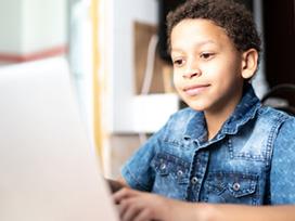 photo of student at computer 